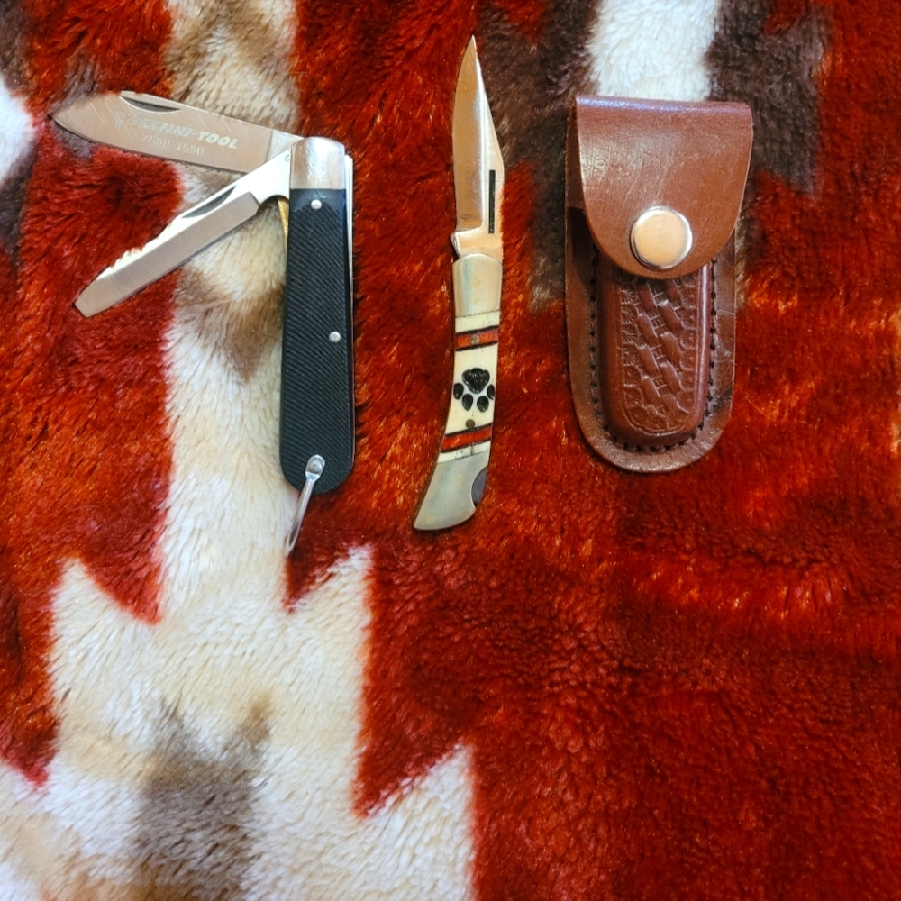 Electricians knife and small knife with bone handle and leather case.